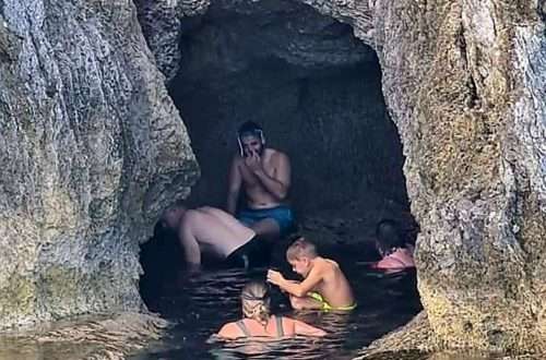 Follow the staff tnto the sea caves and out the other side.